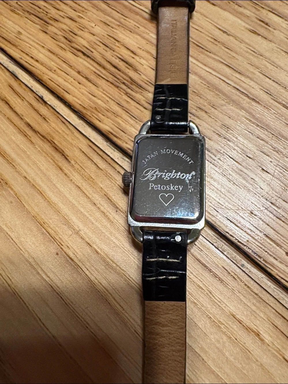 Brighton Petosky is Black Leather Wrap Watch with Silver-Tone Decorative Case